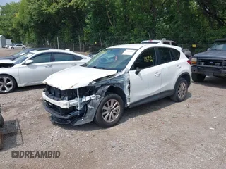 2016 Mazda CX-5 Sport with VIN JM3KE2BY6G0641051, listed as a IAAI auction lot 39959322 with 118,453 mi miles. Bid and sale history available at carsss.com. Image 2.