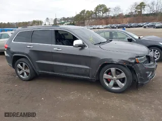 2014 Jeep Grand Cherokee Overland with VIN 1C4RJFCGXEC172008, listed as a IAAI auction lot 41719313 with 164,682 mi miles. Bid and sale history available at carsss.com. Image 13.