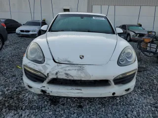 2013 Porsche Cayenne S с VIN WP1AB2A28DLA85229, выставлен на аукционе Copart как лот 50935415 с пробегом 215 629 миль миль и Списание • Salvage title. История ставок и продаж доступна на DreamBid. Изображение 5.