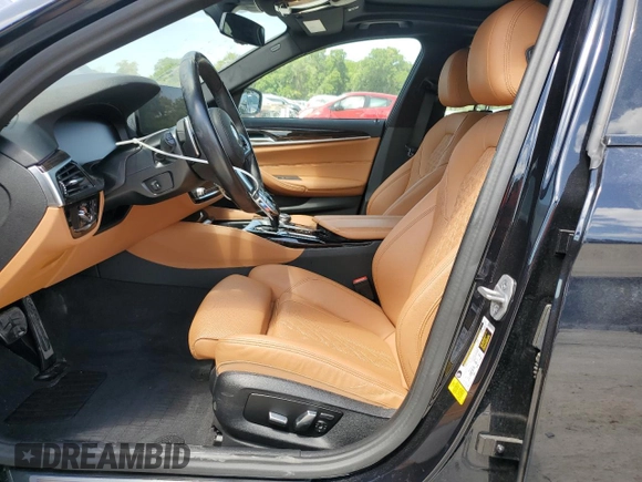 2023 BMW 5 Series 530i with VIN WBA53BH04PWY02486, listed as a Copart auction lot 54519385 with 26,979 mi miles and Salvage title. Bid and sale history available at DreamBid. Image 7.