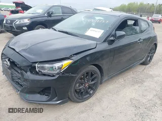 2019 Hyundai Veloster Turbo z VIN KMHTH6AB3KU020159, wystawiony jako IAAI lot #41954737 z przebiegiem 152 070 mil mil oraz . Historia ofert i sprzedaży dostępna na DreamBid. Obrazek 2.