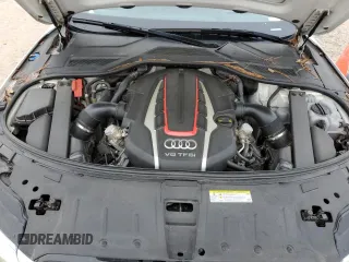 2017 Audi S8 z VIN WUAJ5AFD8HN901401, wystawiony jako Copart lot #77734973 z przebiegiem 133 780 mil mil oraz . Historia ofert i sprzedaży dostępna na DreamBid. Obrazek 11.