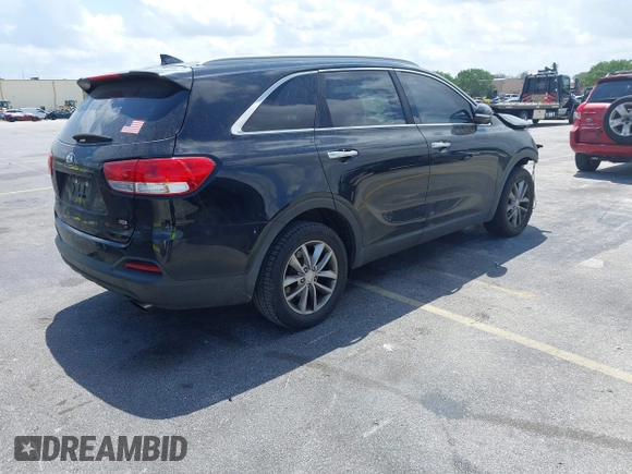 2017 Kia Sorento LX with VIN 5XYPG4A34HG276651, listed as a IAAI auction lot 41971527 with 122,640 mi miles. Bid and sale history available at carsss.com. Image 4.