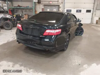 2009 Toyota Camry LE with VIN 4T1BK46K09U589927, listed as a IAAI auction lot 41823383 with 220,589 mi miles. Bid and sale history available at carsss.com. Image 4.