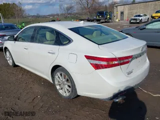 2013 Toyota Avalon XLE with VIN 4T1BK1EB4DU037825, listed as a IAAI auction lot 41963641 with 165,660 mi miles. Bid and sale history available at carsss.com. Image 3.