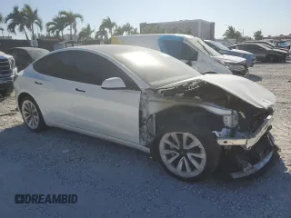 2023 Tesla Model 3 with VIN 5YJ3E1EA9PF552470, listed as a Copart auction lot 48458625 with 13,390 mi miles and Salvage Title. Bid and sale history available at DreamBid. Image 4.
