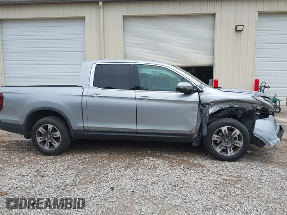 2019 Honda Ridgeline RTL-E with VIN 5FPYK3F75KB019660, listed as a IAAI auction lot 42548495 with 55,969 mi miles and . Bid and sale history available at DreamBid. Image 14.