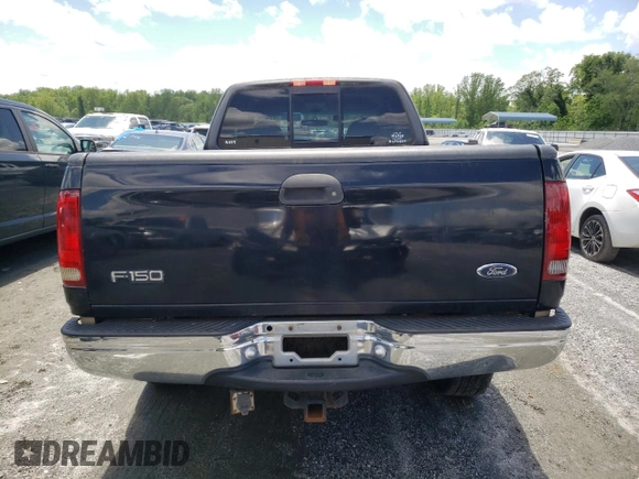 2000 Ford F-150 XL z VIN 1FTRX18L7YNB44005, wystawiony jako Copart lot #56535195 z przebiegiem 187 429 mil mil oraz Szkoda całkowita • Salvage title. Historia ofert i sprzedaży dostępna na DreamBid. Obrazek 6.