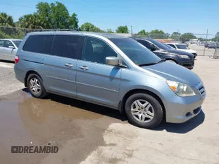 2006 Honda Odyssey EX-L with VIN 5FNRL38776B098021, listed as a IAAI auction lot 42036487 with 176,043 mi miles. Bid and sale history available at carsss.com. Image 1.