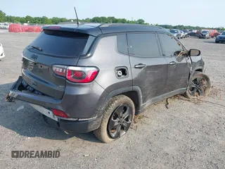 2018 Jeep Compass Latitude with VIN 3C4NJDBB0JT395844, listed as a IAAI auction lot 42405343 with 140,220 mi miles and . Bid and sale history available at DreamBid. Image 4.