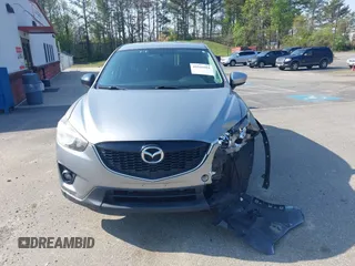 2014 Mazda CX-5 Touring with VIN JM3KE2CY9E0310315, listed as a IAAI auction lot 41943991 with 98,359 mi miles and . Bid and sale history available at carsss.com. Image 12.