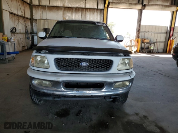 1998 Ford F-150 с VIN 1FTRX18L0WKA53124, выставлен на аукционе Copart как лот 66466945 с пробегом 252 908 миль миль и Чистый • Clean title. История ставок и продаж доступна на DreamBid. Изображение 5.
