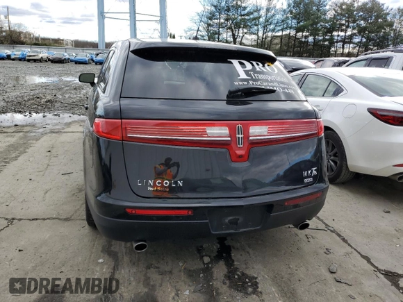 2019 Lincoln MKT with VIN 2LMHJ5NK5KBL04515, listed as a Copart auction lot 49147854 with 126,236 mi miles and Salvage Title. Bid and sale history available at DreamBid. Image 6.