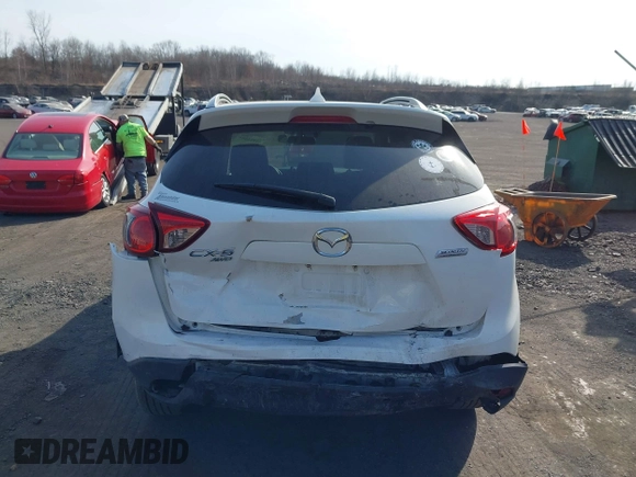2016 Mazda CX-5 Grand Touring with VIN JM3KE4DYXG0836692, listed as a IAAI auction lot 41812584 with 119,302 mi miles. Bid and sale history available at carsss.com. Image 16.