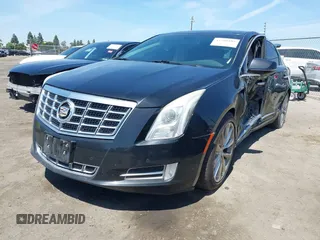 2013 Cadillac XTS Luxury z VIN 2G61R5S32D9226506, wystawiony jako IAAI lot #42208105 z przebiegiem 140 255 mil mil oraz . Historia ofert i sprzedaży dostępna na DreamBid. Obrazek 2.