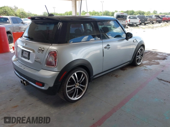 2008 MINI Hardtop S with VIN WMWMF73548TV35548, listed as a IAAI auction lot 42521348 with 104,427 mi miles and . Bid and sale history available at DreamBid. Image 4.