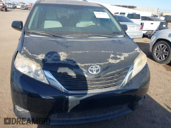 2012 Toyota Sienna LE AAS with VIN 5TDKK3DC7CS255500, listed as a IAAI auction lot 41467563 with 146,306 mi miles. Bid and sale history available at carsss.com. Image 12.