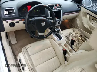 2007 Volkswagen Eos 2.0T with VIN WVWFA71F57V052000, listed as a Copart auction lot 87598495 with 128,610 mi miles and Salvage Title. Bid and sale history available at DreamBid. Image 8.