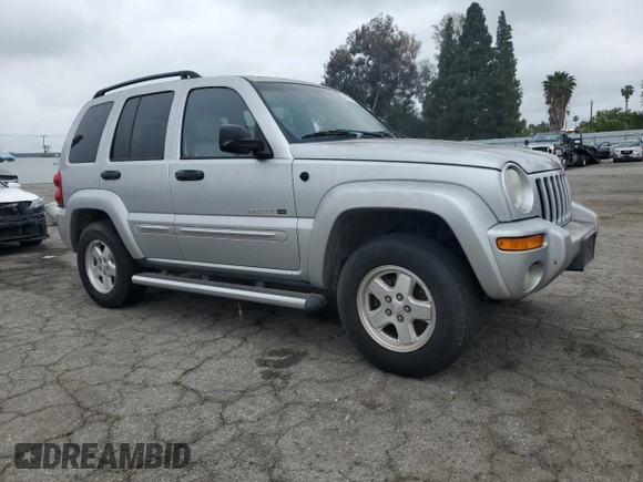 2002 Jeep Liberty Limited with VIN 1J8GK58K52W303098, listed as a Copart auction lot 56005185 with 77,206 mi miles and Clean title. Bid and sale history available at DreamBid. Image 4.