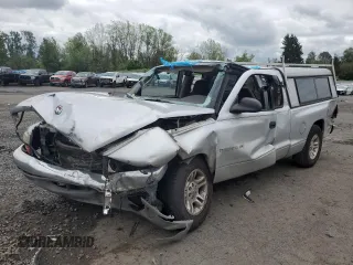 2001 Dodge Dakota Sport z VIN 1B7GL22N81S113985, wystawiony jako Copart lot #56574005 z przebiegiem Nie podano mil oraz Szkoda całkowita • Salvage title. Historia ofert i sprzedaży dostępna na DreamBid. Obrazek 1.
