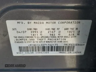 2007 Mazda 3 S Touring z VIN JM1BK343071762175, wystawiony jako Copart lot #88853515 z przebiegiem 110 160 mil mil oraz Szkoda całkowita • Salvage title. Historia ofert i sprzedaży dostępna na DreamBid. Obrazek 12.