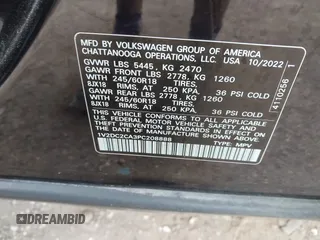 2023 Volkswagen Atlas SE z VIN 1V2DC2CA3PC208888, wystawiony jako IAAI lot #41926114 z przebiegiem 36 645 mil mil oraz . Historia ofert i sprzedaży dostępna na DreamBid. Obrazek 9.
