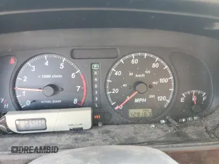 2002 Isuzu Rodeo S with VIN 4S2CK58W124307433, listed as a Copart auction lot 75447074 with 129,163 mi miles and Salvage title. Bid and sale history available at DreamBid. Image 9.