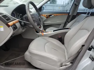 2009 Mercedes-Benz E-Class Luxury 3.5L with VIN WDBUF56X39B363877, listed as a Copart auction lot 54974735 with 221,870 mi miles and Clean Title. Bid and sale history available at carsss.com. Image 7.