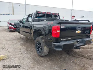 2018 Chevrolet Silverado 1500 Custom with VIN 3GCUKPEC0JG155068, listed as a IAAI auction lot 41277139 with 104,351 mi miles. Bid and sale history available at carsss.com. Image 3.
