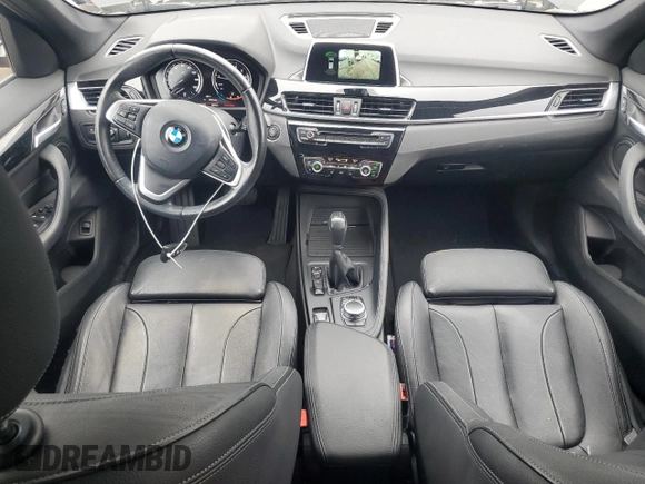 2018 BMW X1 xDrive28i z VIN WBXHT3C30J5L30276, wystawiony jako Copart lot #58903045 z przebiegiem 86 778 mil mil oraz Szkoda całkowita • Salvage title. Historia ofert i sprzedaży dostępna na DreamBid. Obrazek 8.