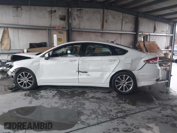 2017 Ford Fusion SE with VIN 3FA6P0H74HR196954, listed as a IAAI auction lot 41636002 with 70,366 mi miles and . Bid and sale history available at DreamBid. Image 14.