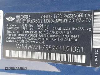 2007 MINI Hardtop S with VIN WMWMF73527TL91061, listed as a IAAI auction lot 41842104 with 65,259 mi miles and . Bid and sale history available at DreamBid. Image 9.