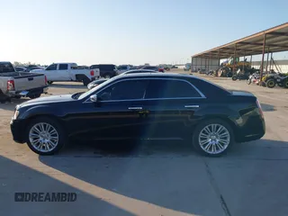 2011 Chrysler 300 with VIN 2C3CA6CT8BH595198, listed as a IAAI auction lot 41983417 with 182,067 mi miles. Bid and sale history available at carsss.com. Image 15.
