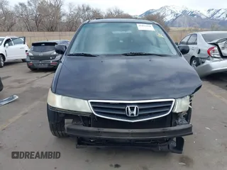 2004 Honda Odyssey EX-L with VIN 5FNRL18914B037976, listed as a IAAI auction lot 41893438 with Not Provided miles and . Bid and sale history available at DreamBid. Image 12.