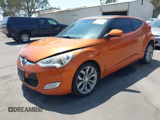 2012 Hyundai Veloster w/Gray Int with VIN KMHTC6ADXCU037879, listed as a IAAI auction lot 42093850 with 189,991 mi miles and . Bid and sale history available at DreamBid. Image 2.