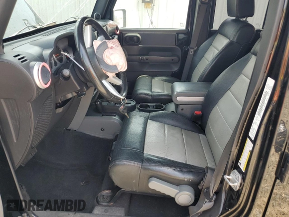 2008 Jeep Wrangler Unlimited Sahara with VIN 1J4GA59178L607960, listed as a Copart auction lot 57855995 with 122,913 mi miles and Salvage title. Bid and sale history available at DreamBid. Image 7.