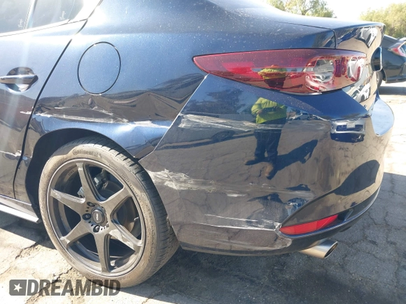 2021 Mazda 3 S with VIN JM1BPAALXM1326956, listed as a IAAI auction lot 42304248 with 55,104 mi miles and . Bid and sale history available at DreamBid. Image 22.