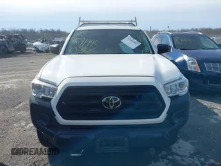 2021 Toyota Tacoma SR with VIN 3TYRX5GN6MT007673, listed as a IAAI auction lot 41691995 with 97,735 mi miles and . Bid and sale history available at DreamBid. Image 6.