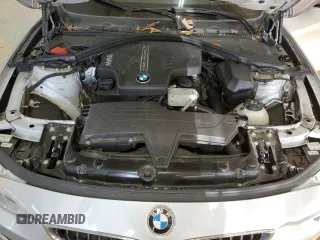 2015 BMW 4 Series 428i z VIN WBA4A5C51FG052009, wystawiony jako Copart lot #89110235 z przebiegiem 156 675 mil mil oraz Szkoda całkowita • Salvage title. Historia ofert i sprzedaży dostępna na DreamBid. Obrazek 13.