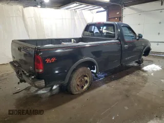 1997 Ford F-150 z VIN 1FTDF18W3VNC15218, wystawiony jako Copart lot #87706315 z przebiegiem 206 418 mil mil oraz Szkoda całkowita • Salvage title. Historia ofert i sprzedaży dostępna na DreamBid. Obrazek 3.