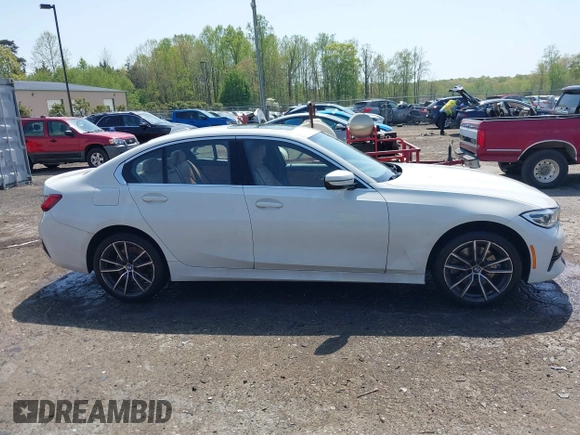 2019 BMW 3 Series 330i xDrive with VIN WBA5R7C54KAJ79214, listed as a IAAI auction lot 42001361 with 103,265 mi miles. Bid and sale history available at carsss.com. Image 14.