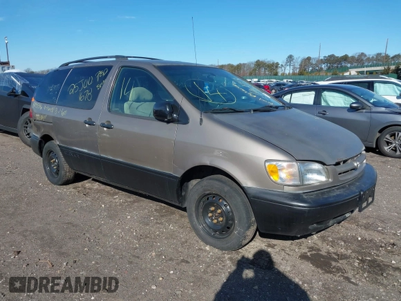 1999 Toyota Sienna LE with VIN 4T3ZF13CXXU121819, listed as a IAAI auction lot 41607624 with 999,999 mi miles. Bid and sale history available at carsss.com. Image 1.