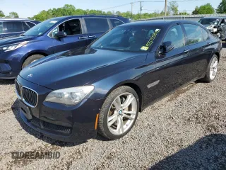 2014 BMW 7 Series 740Li xDrive z VIN WBAYF4C58ED281817, wystawiony jako Copart lot #55755815 z przebiegiem 112 398 mil mil oraz Szkoda całkowita • Salvage title. Historia ofert i sprzedaży dostępna na DreamBid. Obrazek 1.