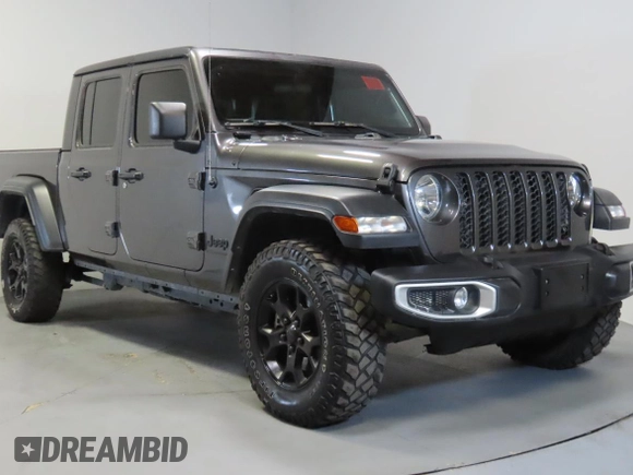 2023 Jeep Gladiator Freedom with VIN 1C6JJTAG9PL557861, listed as a Copart auction lot 56429485 with 44,716 mi miles and Salvage title. Bid and sale history available at DreamBid. Image 1.