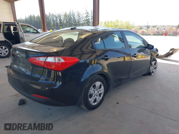 2015 Kia Forte LX with VIN KNAFK4A60F5290540, listed as a IAAI auction lot 42046059 with 107,232 mi miles. Bid and sale history available at carsss.com. Image 4.
