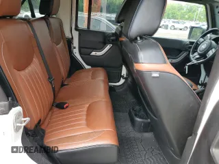 2014 Jeep Wrangler Unlimited Rubicon with VIN 1C4HJWFG4EL114743, listed as a Copart auction lot 61397575 with 110,222 mi miles and Salvage title. Bid and sale history available at DreamBid. Image 10.