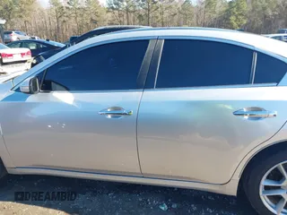 2009 Nissan Maxima S with VIN 1N4AA51E69C808587, listed as a IAAI auction lot 41376757 with 302,539 mi miles and . Bid and sale history available at DreamBid. Image 14.