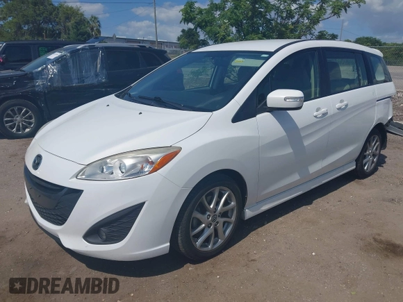 2013 Mazda 5 Touring with VIN JM1CW2CL8D0153437, listed as a IAAI auction lot 42181891 with 118,610 mi miles and . Bid and sale history available at DreamBid. Image 2.