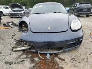 2006 Porsche Cayman S с VIN WP0AB298X6U781940, выставлен на аукционе Copart как лот 70092204 с пробегом 116 506 миль миль и Списание • Salvage title. История ставок и продаж доступна на DreamBid. Изображение 5.