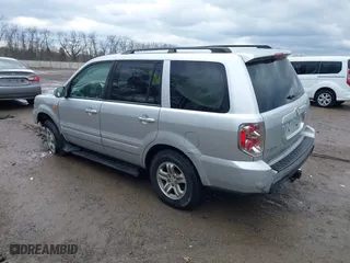 2006 Honda Pilot EX with VIN 2HKYF18426H553632, listed as a IAAI auction lot 41656610 with 154,470 mi miles. Bid and sale history available at carsss.com. Image 3.